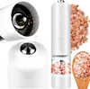 A collage of images showing a white electric pepper grinder with pink salt crystals, and a wooden spoon filled with pink salt crystals. Podgląd zdjęcia produktu