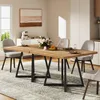 A dining room scene with a wooden table and chairs. Produktbild-Vorschau