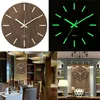 A collage of images showing a wooden wall clock with luminous markers, both in light and dark settings, and also in lifestyle shots within a dining room and an office. Produktbild-Vorschau