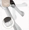 Close-up view of a baby high chair, highlighting adjustable features and a footrest. Voir les images du produit