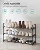 A multi-tiered shoe rack filled with various shoes and boots, displayed against a light-colored wall. Anteprima dell’immagine prodotto