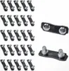 A collection of chainsaw chain connecting links arranged in rows and two individual links shown separately. Produktbild-Vorschau