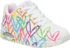 A single white sneaker with colorful heart graphics. Voir les images du produit