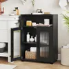 A black bathroom cabinet with glass doors is shown in a bathroom setting, next to a sink and a plant. Anteprima dell’immagine prodotto