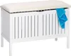 A white storage bench with a beige cushion and a blue towel draped over the side. Podgląd zdjęcia produktu