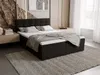 A bedroom scene featuring a bed with storage, a rug, and decorative elements. Náhled obrázku produktu