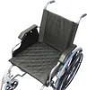A close-up view of a black wheelchair seat cushion on a wheelchair. Produktbild-Vorschau
