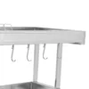 A close-up view of a stainless steel kitchen shelf with hooks. Podgląd zdjęcia produktu