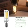 Two LED filament bulbs, one in the foreground and one in a fixture in the background, with product specifications listed. Produktbild-Vorschau