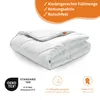 A folded white blanket is shown on a white background with marketing text and logos around it. Voir les images du produit