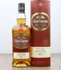A bottle of Glen Turner Heritage Double Cask Single Malt Scotch Whisky and its cylindrical presentation box are displayed on a wooden surface. Produktbild-Vorschau