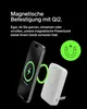 A smartphone is magnetically attached to a white power bank, demonstrating wireless charging. Voir les images du produit