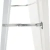 A close-up view of a metal hinge mechanism on a white product, likely a mirror or easel. Náhľad obrázku produktu
