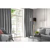 A living room scene with a sofa, curtains, and a floor lamp. Produktbild-Vorschau