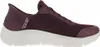 A side view of a burgundy Skechers slip-on sneaker with a white sole. Anteprima dell’immagine prodotto