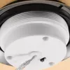 A close-up view of the base of a light string, showing the connection point for the wire and a small switch. Voir les images du produit