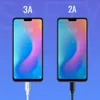 Two smartphones are shown side-by-side, each displaying a charging animation. The left phone indicates 71% charge with a '3A' label above it, and is connected to a white charging cable. The right phone indicates 50% charge with a '2A' label above it, and i Produktbild-Vorschau