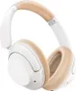 A white and tan over-ear headphone is shown against a white background. Voir les images du produit