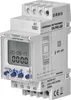 A white astronomical time programmer with a digital display and buttons, mounted on a DIN rail. Voir les images du produit