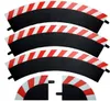 Several curved track pieces with red and white striped borders. Produktbild-Vorschau
