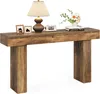 A wooden console table with decorative items on top, set against a white background. Podgląd zdjęcia produktu