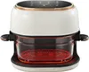 A studio shot of a transparent air fryer with a digital display on top. Produktbild-Vorschau