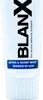 A close-up of a white toothpaste tube with black and blue branding. Anteprima dell’immagine prodotto