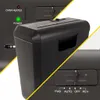 A collage of close-up shots of a black paper shredder, showing its controls and indicator lights. Produktbild-Vorschau