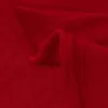 A close-up view of a folded red blanket. Produktbild-Vorschau