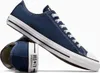 A pair of navy blue Converse All Star low-top sneakers. Produktbild-Vorschau