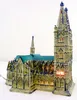 A ceramic model of a cathedral, lit from within, against a white background. Produktbild-Vorschau