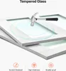 A hammer is about to strike a piece of tempered glass, illustrating its durability. Podgląd zdjęcia produktu