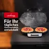 A waffle maker with two heart-shaped waffles topped with berries is shown on a countertop. Text and a logo are overlaid on the left side of the image. Produktbild-Vorschau