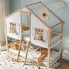 A children's house-shaped bunk bed with a ladder, decorated with a flower clock and a cloud on the wall. Produktbild-Vorschau