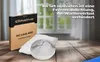 A box and a roll of window sealing tape are placed on a wooden table in front of a window. Produktbild-Vorschau