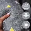 A close-up of a soft dog bed with a hand touching it, alongside three circular icons representing product features. Anteprima dell’immagine prodotto