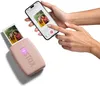 A person is using a smartphone to print a photo from their phone to a pink Instax mini Link 3 printer. Anteprima dell’immagine prodotto