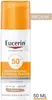 A product shot of a Eucerin sunscreen bottle with text overlays indicating shade and volume. Náhled obrázku produktu