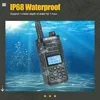 A walkie-talkie submerged in water, demonstrating its waterproof capabilities. Produktbild-Vorschau