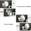 Collage of images showing a white suction cup wall mirror in different positions and orientations. Produktbild-Vorschau