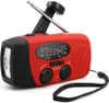 A red and black multi-functional emergency radio with a flashlight and hand crank. Produktbild-Vorschau