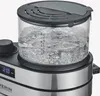 A close-up view of a coffee maker with water boiling inside the glass carafe. Produktbild-Vorschau