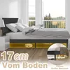 A modern bedroom with a bed, nightstands, and a view of trees and sky through a large window. Náhled obrázku produktu