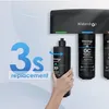A hand is shown replacing a water filter cartridge in a Waterdrop under-sink water filtration system. The system has multiple filter cartridges, and the text indicates a quick 3-second replacement process. Anteprima dell’immagine prodotto