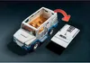 A toy armored car with its roof detached, shown on a dark background. Produktbild-Vorschau