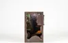 A miniature diorama of a scene, possibly from Harry Potter's Diagon Alley, is displayed against a white background. Produktbild-Vorschau
