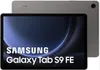 A Samsung Galaxy Tab S9 FE tablet is shown with its screen displaying marketing text. The back of another tablet is visible behind it. Produktbild-Vorschau