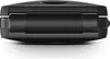 A top-down view of a closed black flip phone. Náhled obrázku produktu
