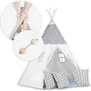 A white and gray tipi tent with wooden poles and decorative pillows. Podgląd zdjęcia produktu