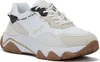 A single white Guess sneaker with beige and gold accents is shown against a white background. Náhled obrázku produktu